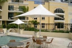 Poolside stationary single post umbrella